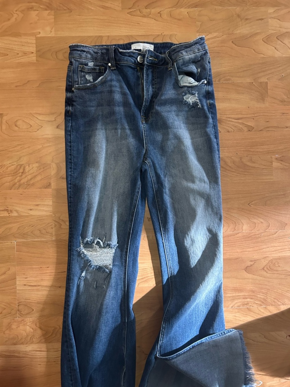 Risen Distressed Blue Denim Jeans